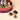 Vintage Dream Hamper Small: a refined red and blue gift box accompanied by three exquisite, unwrapped Chocoviar chocolates. - AI generated text