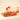 An open Venchi Natura gift box featuring Chocoviar and rectangular ingots, displayed beside a ribbon-adorned gift box. - AI generated text